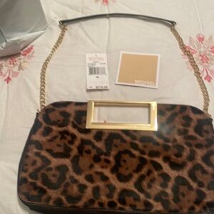 Micheal Kors leopard clutch
